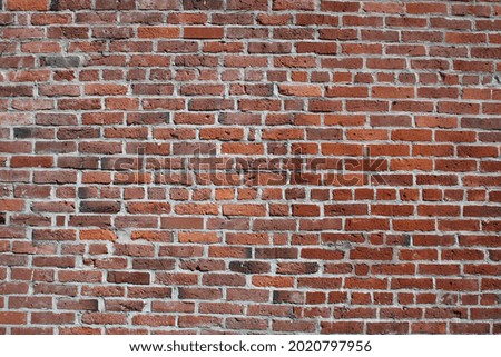 Textures and patterns of red-brown brick walls