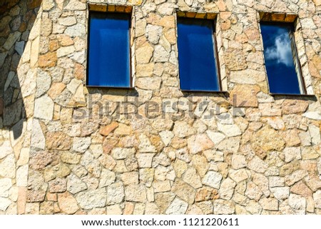 Textures of stone masonry. Fortress wall. Old stone
