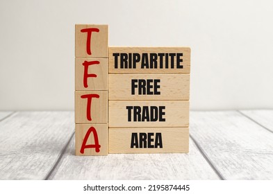 TFTA - Tripartite Free Trade Area Acronym On Wooden Blocks