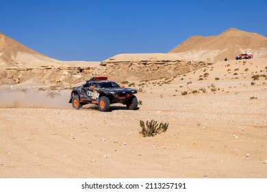 Thadiq, Saudi Arabia - January 6, 2022: The Audi RS Q E-TRON car of the Team Audi Sport is running Stage 5 of the 2022 Dakar Rally