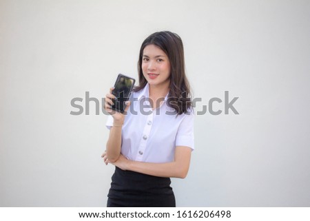 thai adult student university uniform beautiful girl show her smart phone