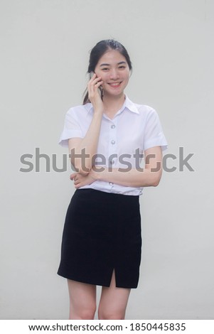 thai adult student university uniform beautiful girl calling smartphone