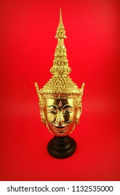 Thai Art Gold Face Mask On Red Background.                                