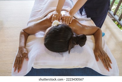 Thai Asian Women Get Thai Massage At A Luxury Resort In Thailand. 