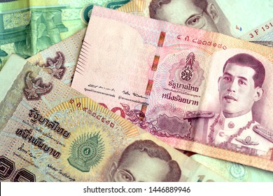 Thai baht various banknotes closeup. Money background - Shutterstock ID 1446889946