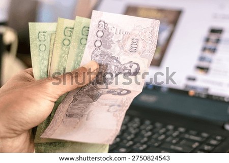 The Thai baht, whose value fluctuates according to global circumstances and the economy.