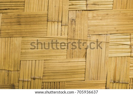 Thai  Bamboo basketry background.basket making is the process of weaving or sewing pliable materials into two- or threedimensional artefacts, 