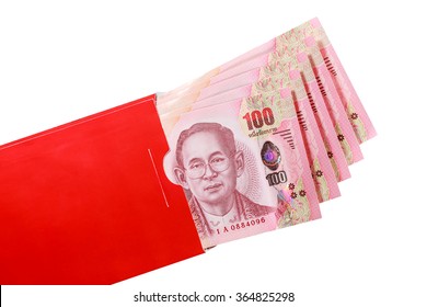 Thai Bank Note In Red Envelope For Chinese New Year Gift On White Background