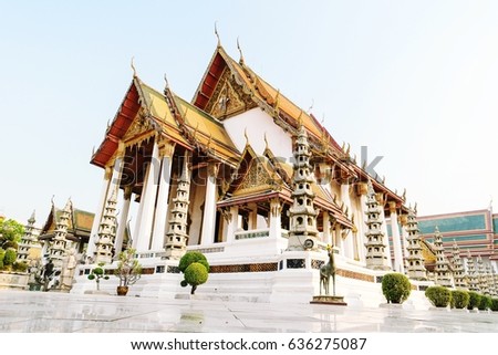Thai Buddhist temple Bangkok Thailand ,Wat Suthat, better known for the towering red Giant Swing that stands at its entrance, is one of the oldest and most impressive buddhist temples in Bangkok, 