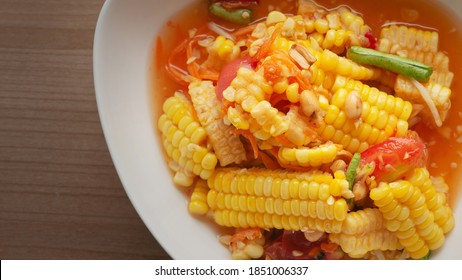 Thai Chili & Lime Fruit Salad - Som Tam Kao Poad  - Spicy And Lime Corn With Vegetable Salad - Close Up Shot