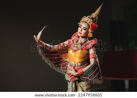 Thai classical dance performance Manohra Buchayan.Art culture Thailand Dancing in masked khon.Thai dance performance.Thai show.The khon portrait.Portrait gray background.Thai dacnce.(Portrait Ms shot)