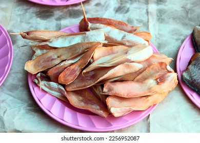 Thai cuisine. Baked fish, hot smoked fish, bloater on a plate. - Shutterstock ID 2256952087
