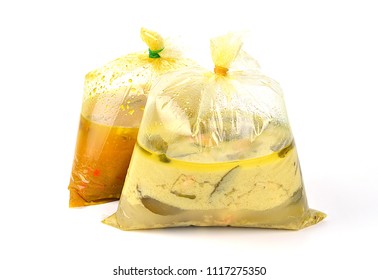 Thai Curry In Plastic,polypropylene Bag Isolated On White Background.Concept For Unhealthy Food Cause Containers Contaminated With Chemicals.Toxins Can Accumulate In The Body And Can Be Cancer.