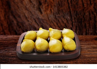 Thai Dessert : Durian Mochi Or Moon Cake Or Durian Daifuku On Wood Chop, Moon Cake For Mid Autumn Festival, Chinese Happy New Year And Moon Festival. Still Life In Studio.