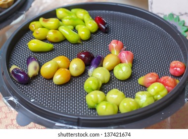 Thai Dessert Made From Chickpea Mash, Mold And Painted To Look Like Real Fruit Before Coated In Jelly