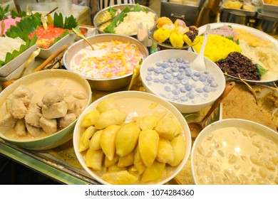 Thai Desserts There Are Plenty Of Examples, Dumplings In Coconut Cream,sweet Sticky Rice With Mango, Thai Crispy Pancakes, Taro Balls Simmered In Coconut Syrup