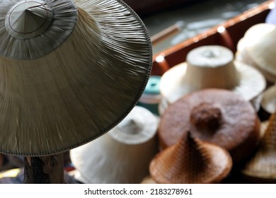 The Thai farmer's hat or ngob is a traditional hat used in Thailand. More complex in design than the related Asian conical hat. made of ola palm leaves laid over a plaited bamboo-strip frame