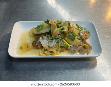 Thai Fermented Mustard Green Salad with Crispy Gourami Fish