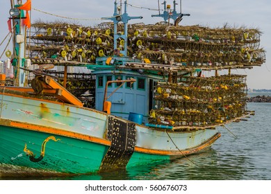 Thai fishing boat with lobster pots.