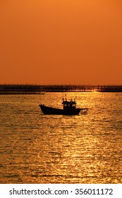 Thai Fishing Boat In Sunset