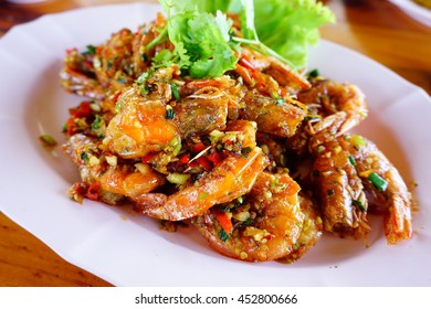 Thai Food, Fried Shrimp With Chili, Pepper And Garlic On White Plate -Selective Focus