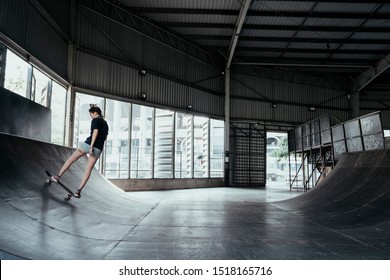 Thai girl playing skateboard with participation. - Powered by Shutterstock