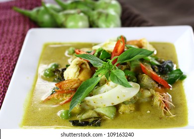 Thai green curry with shrimp and squid