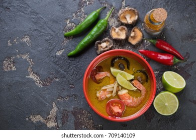 Thai Green Curry Soup With Some Cooking Components On A Brown Stone Background, Above View With Space, Horizontal Shot