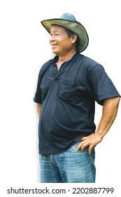 Thai Male, Aged 50-55 Years Vertical Side Shot Wearing A Big Cowboy Hat, Smiling Like A Dark-skinned Asian Man On A White Background.