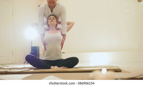 Thai massage - caucasian model female - stretching of the spine