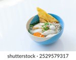 Thai noodle with pork on white background, Noodle soup, Rice vermicelli Noodle soup with pork balls in white bowl, Asian Bowl Noodles Thai style cooking, ก๋วยเตี๋ยวน้ำ, ก๋วยเตี๋ยวลูกชิ้นปลา