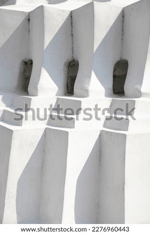 Thai pattern of ancient white pillars with light and shadow