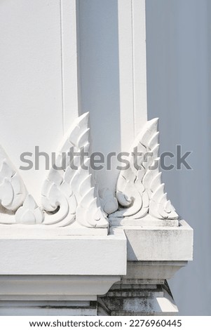 Thai pattern of ancient white pillars with light and shadow
