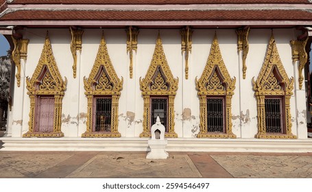 Thai pattern on the window of the chapel of Phummarin Kudi Thong Temple, Amphawa District, Samut Songkhram Province.