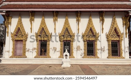 Thai pattern on the window of the chapel of Phummarin Kudi Thong Temple, Amphawa District, Samut Songkhram Province.