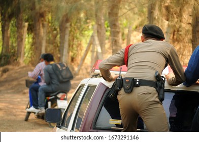 
The Thai Police On The Royal Thai Police Car Chase To Arrest The Culprits  Outrun The Police By Motorcycle On The Local Road.