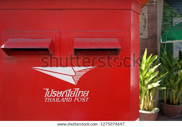 Thai post box closeup\
post box divided into two compartments for sending domestic mail\
and letters sent to foreign countries at Chiang mai, thailand -\
Saturday, January 5,2019