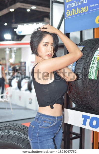 Thai pretty\
woman, Big motor sale 2020,There are BITEC Exhibition Centre Bangna\
in BANGKOK, THAILAND - 23 August\
2020