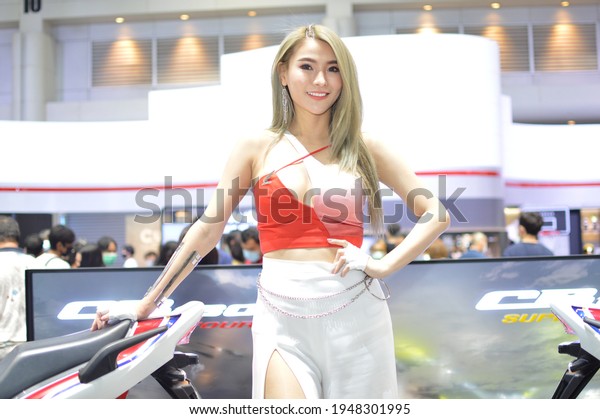 Thai pretty woman, Motor Show 2021,There are IMPACT\
Arena, Exhibition and Convention Center in BANGKOK, THAILAND - 28\
March 2021