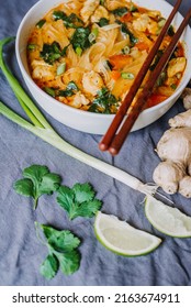 Thai Red Curry Noodle Soup With Chicken In A Bowl