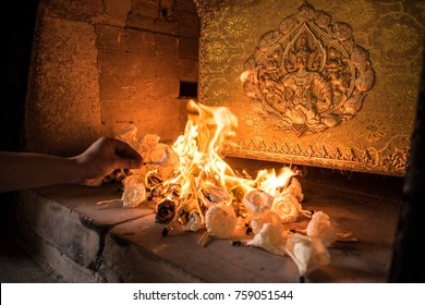 Thai Religious Ritual For The Cremation. The Corpse In The Coffin Is Burning In The Cremate.