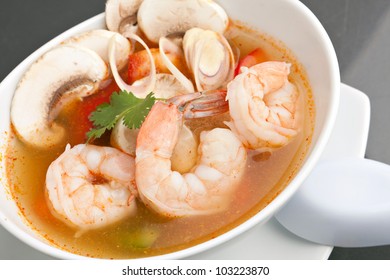 Thai Shrimp Soup Bowl Close Up With Mushrooms And Vegetables.