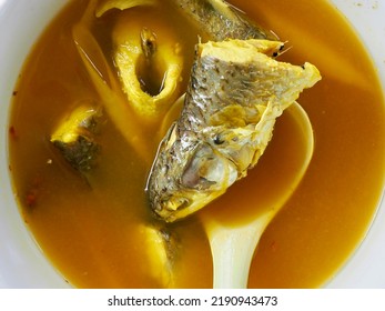 Thai Southern Traditional Food Style ,Spicy Sour Yellow Curry With Mullet In A White Bowl