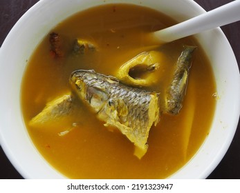 Thai Southern Traditional Food Style ,Spicy Sour Yellow Curry With Mullet In A White Bowl