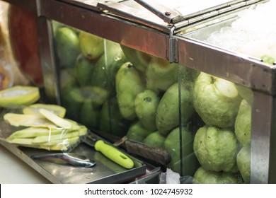 Thai Street Fruit Vendor Cart At Night In Bangkok, Thailand.