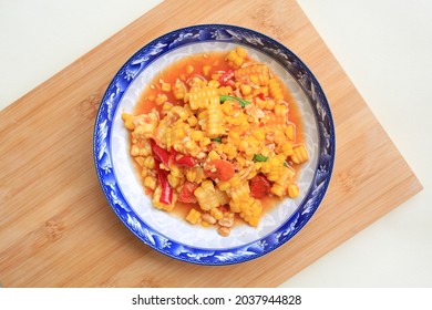 Thai Style Chili And Lime Corn Salad In Plate Against Wooden Board. Spicy Vegetable Salads. Top View