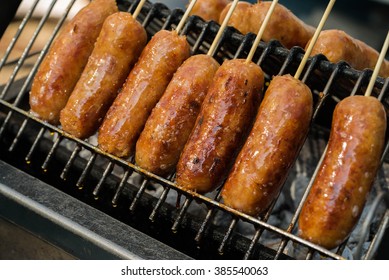 Thai Style Grilled Sausage on hot Stove 