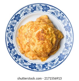 Thai Style Omelette In A Blue Floral Plate , Isolated On White Background With Clipping Path