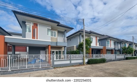 Thai Suburban areas with modern family houses, newly built modern family homes in Thailand, Thai family houses, and apartment houses, newly build streets with modern houses. 