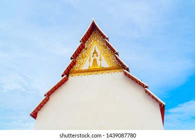 Thai Temple roof top with blue sky.